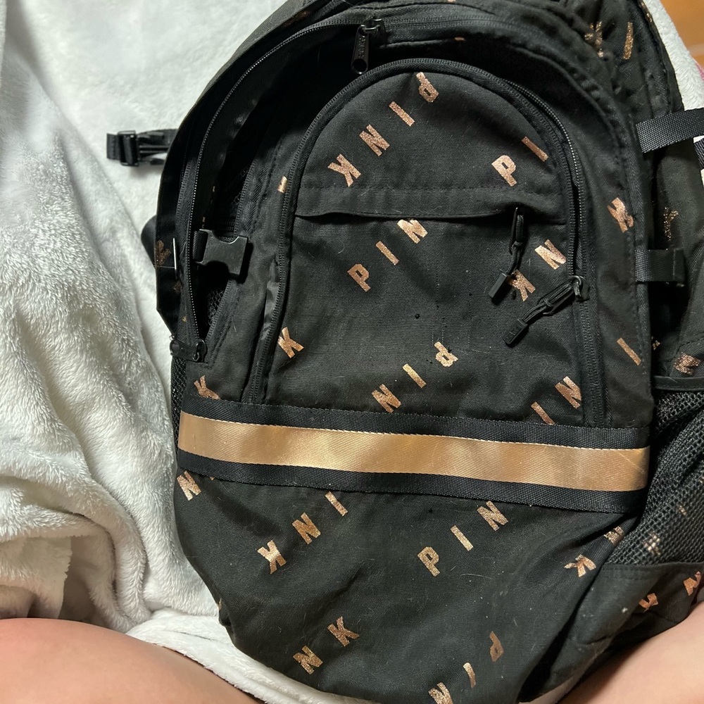 Pink black and gold book bag